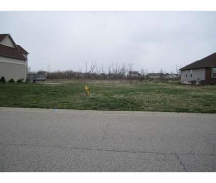 Waterfront lot - vacant building site at Located At 8121 Jack Pine Dr in Ypsilanti MI is a Land