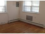 First Floor Apt with heat, electric, HW included. Near Hollis Ave and Q buses