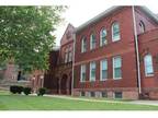 Studio - Columbian School Apartments