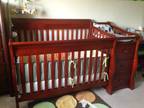 Beautiful solid wood crib w/changing table & storage -
