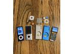 lot of apple ipod nanos 2nd and 5th generation