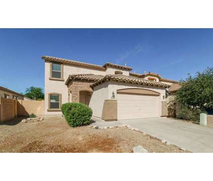 Single Family Home at 18550 W Sanna Street in Waddell AZ is a Home