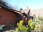 Foreclosure! Private mountain home with nice views & sounds of a rushing stream.