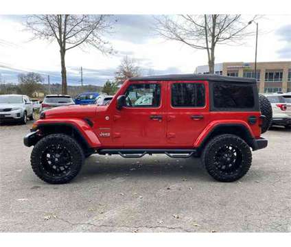 2019 Jeep Wrangler Unlimited Sahara is a Red 2019 Jeep Wrangler Unlimited Sahara SUV in Canton GA