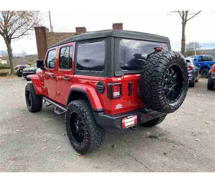 2019 Jeep Wrangler Unlimited Sahara is a Red 2019 Jeep Wrangler Unlimited Sahara SUV in Canton GA