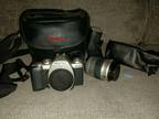 Pentax zx-m camera with case, lens, flash.
