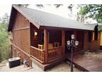 a beautiful custom built cabin home in upper Moonridge