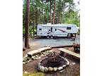 Campground site and like new Jayco designer fifth wheel in Washington