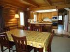 $145 / 4br - 2800ft² - Lakeside log cabin, sleeps 10, satellite TV