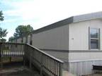 $595 / 4br - 4 bedroom 2 bath mobile home; large deck; big lot next to woods.