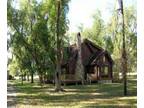 H-117 - Log home on 82 acres