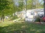 $525 / 2br - 1100ft² - retirees paradise - relax, fish, cabin at edge lake