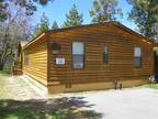 Modern and charming with log cabin exterior!