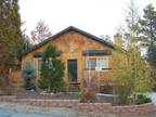 Log-sided home with three bedrooms and two baths