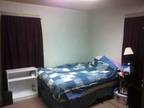 Big bedroom in bright, cheery house near downtown (W 8th St) (map)