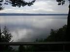 Breathtaking Views of Puget Sound in this one of a kind Beach Ho