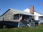 Waterfront, seasonal beach cottage, only steps to warm sand