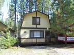 A comfortable two story three bedroom cabin located in lower Moonridge