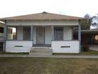 $650 / 2br - Great HOME with lrg fenced frt & back yard Great Value (Tulare) 2br