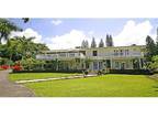 Old hawaii plantation style home with all modern amenities, lush foilage