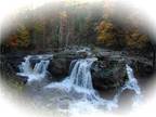 The Waterfall House. A vacation rental home perched at the edge of Niobe Falls.