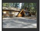 Super clean family cabin on a large spacious lot with a fenced yard!