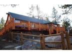 Beautiful log style cabin across the street from the lake