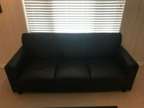 Black Leather 3 person sofa, slight damage to armrest