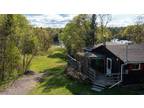 145' WATERFRONT on MAGNETAWAN RIVER! Over 2 ACRES of PRIVACY!