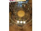 47 round glass top table and 3 metal chairs