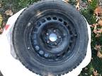 Four 205/55R16 Cooper Evolution Winter Tires with Rims