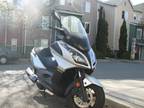 $3,500 OBO Kymco Downtown 300i with only 5400 miles