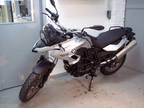 2013 BMW F700GS, metalic silver with 287 miles.