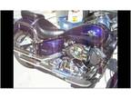 $3,750 A purple 2003 Yamaha V-star 650 classic cruiser