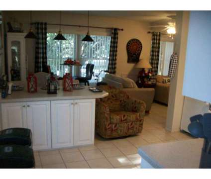 Clearwater FL Trade Condo For Home W Pool 33763 Monday January 16th 2023 at 2416 World Pkwy Blvd, Unit 22 in Clearwater FL is a Condo