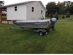 Fishing Boat, Motor, and Trailer For Sale