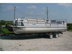 1986 24ft Pontoon with 65hp motor and trailer runs great