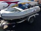 9' Inflatable Boat with trailer and outboard motor -