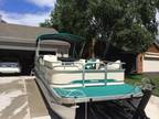 24 ft Premier Pontoon with Tandem Axel Trailer on Auction