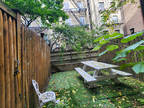 New York 1BR 1BA, PRIVATE BACKYARD AND RENOVATED KITCHEN.