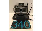 Vintage Polaroid Land Camera, Model 340, with manual