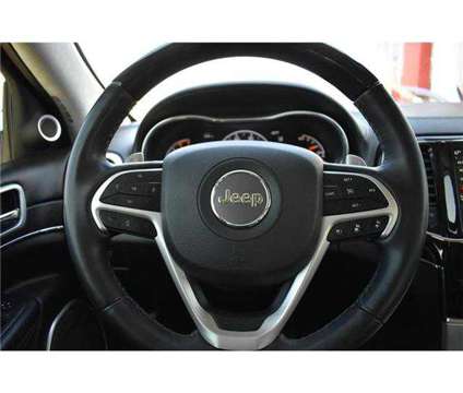 2021 Jeep Grand Cherokee Summit 4x4 is a Red 2021 Jeep grand cherokee Summit Car for Sale in Odessa TX