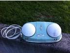 Vintage Dr. Scholl's electronic foot massager, retro mint green