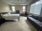 Cheerful Spacious Upper level Master Suite with off street parking.