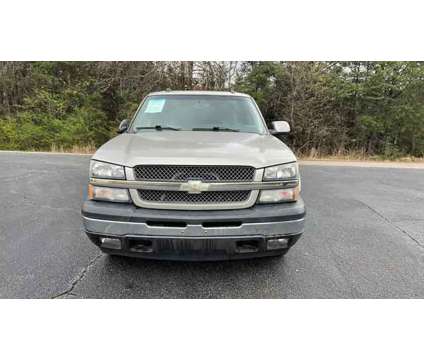 2005 Chevrolet Avalanche 1500 for sale is a Gold, Silver 2005 Chevrolet Avalanche 1500 Trim Car for Sale in Cumming GA