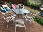 Patio Table and six chairs (no cushions)