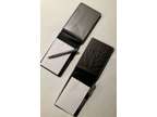2 mini pocket notebooks with leather cover and pen included.