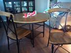 dining table and four chairs