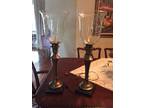 2 brass hurricane style lamps