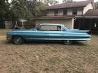 1961 Cadillac Series 62 six window